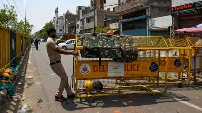 Protesting farmers break barricades, march towards Delhi in defiance