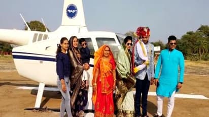 मंदसौर में हेलीकॉप्टर से इकलौते बेटे की बारात लेकर पहुंचा किसान, दुल्हन की विदाई देखने उमड़ा पूरा गांव  