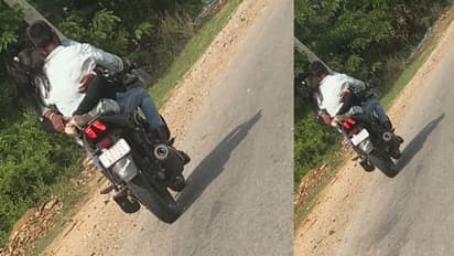 ஓடும் பைக்கின் பெட்ரோல் டேங்கில் அமர்ந்து லிப் டூ லிப்.. காதல் ஜோடி சல்லாபம்.. வைரலாகும் போட்டோஸ்..!