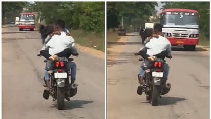 పట్టపగలు నడిరోడ్డుపై రెచ్చిపోయిన ప్రేమ జంట.. బైక్పై రొమాన్స్.. వీడియో వైరల్