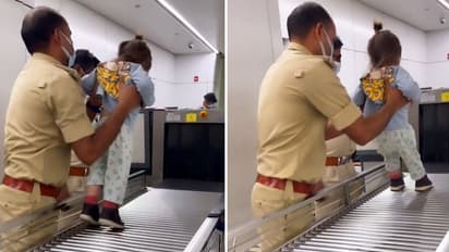 Watch: CISF personnel playing with a kid at Delhi airport; netizens love it