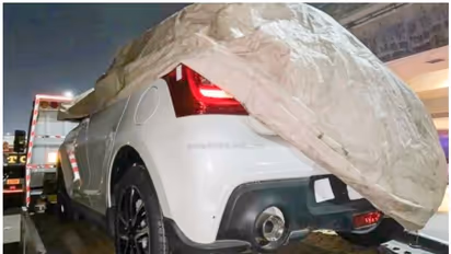 ലോറിപ്പുറത്തേറി, പാതിമൂടി ഒരു സ്വിഫ്റ്റ് ; സംശയങ്ങള്‍ പലവിധം!