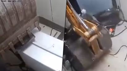 Thieves use JCB machine to steal money from ATM; watch