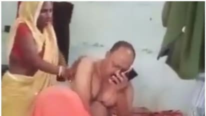 కొడుకు బెయిల్ కోసం వెళితే.. స్టేషన్‌లోనే మహిళతో మసాజ్ చేయించుకున్న పోలీసు అధికారి