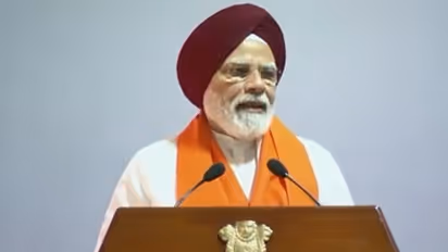 PM Modi wears a turban, hails Sikh community's role in new India
