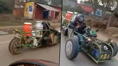 Is the man delivering milk on a Formula 1 car? Watch