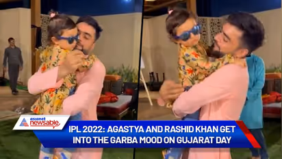 ipl 2022| rashid khan| GT: மூன்றே வார்த்தைகள்தான்: ஹர்திக் பாண்டியாவின் மகனுடன் ரஷித் கான் கொஞ்சல் வீடியோ