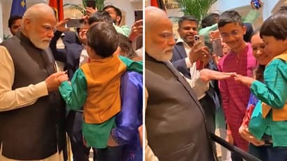 यूरोप विजिट पर PM का अलग अंदाजः मोदी हमारी जान-देश की शान...गुनगुनाते रहे लोग लेकिन मोदी का ध्यान बच्चे पर था