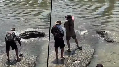 Brave man battles with a crocodile to catch fish; viral video