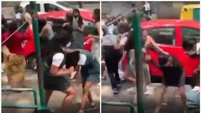 நடுரோட்டில் குடுமிபிடி சண்டை போட்டுக் கொண்ட பள்ளி மாணவிகள் - என்ன காரணம் தெரியுமா?