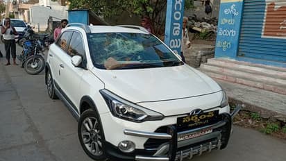 తాడికొండ సర్పంచ్ ఇంటివద్ద దుండగుల హల్ చల్... బండరాళ్లతో కారు ధ్వంసం