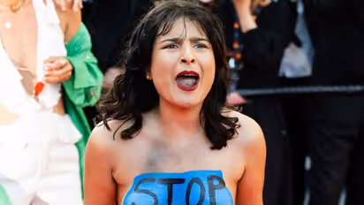 Cannes 2022: Topless woman screams 'stop raping us'; protests against sexual violence in Ukraine