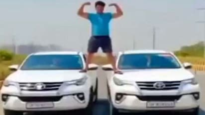 ഓടുന്ന ടൊയോട്ട ഫോർച്യൂണറുകള്‍ക്കു മുകളില്‍ 21കാരന്‍, വാഹനം പൊക്കി പൊലീസ്!