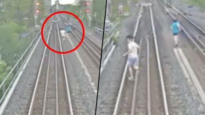 Children have a close shave from being hit by super-fast train; watch