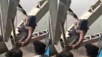 പാലത്തിൽ തൂങ്ങിക്കിടന്ന് ഓടുന്ന ട്രെയിനിൽ നിന്ന് മൊബൈൽ മോഷണം, സ്പൈഡര്മാനോ എന്ന് സോഷ്യൽമീഡിയ