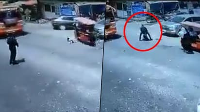 Traffic cop saves toddler who fell from moving e-rickshaw; watch shocking video