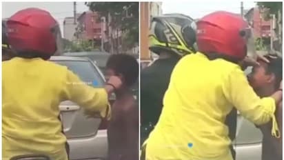 ട്രാഫിക് സിഗ്നലിൽ വച്ച് സഹായം അഭ്യര്‍ഥിച്ചെത്തിയ ആൺകുട്ടിയുടെ കവിളില്‍ പിടിക്കുന്ന യുവതി; വെെറലായി വീഡിയോ