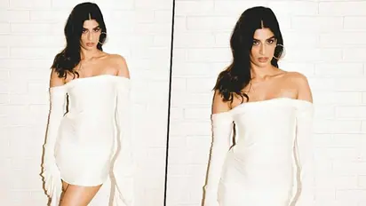 Hotness alert! Erika Packard sets the temperature rising in a sexy white dress