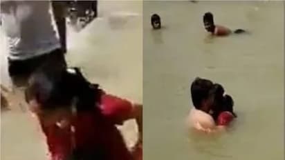 நதியில் நீராடியபடியே முத்தம் கொடுத்து உல்லாசம்.. புதுமண தம்பதியரை வெளுத்து கட்டிய கூட்டம்.. போலீஸ் FIR.