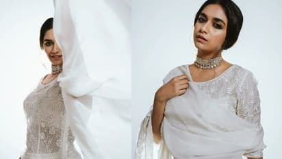 Keerthy Suresh:తెరచాటు నుంచి తొంగి చూస్తున్న అందం, కనువిందు చేస్తోన్న కీర్తి సురేష్ సోయగం