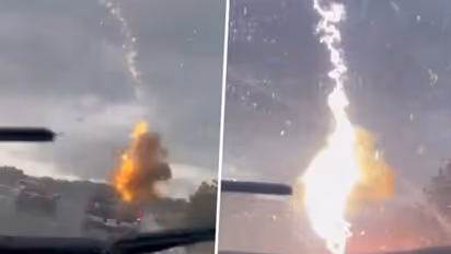 Lightning hits car in Florida; terrifying moment caught on cam