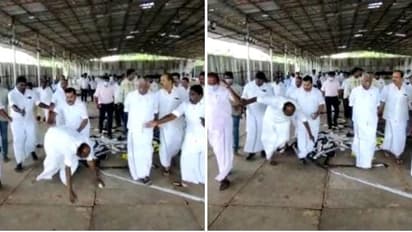 பொதுக்குழு பணியை பார்வையிட சென்ற முன்னாள் அமைச்சர்  நத்தம் விஸ்வநாதன் கால் தவறி கிழே விழுந்ததால் பரபரப்பு