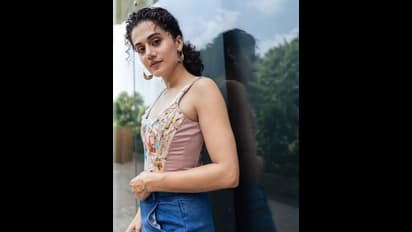 குட்டி டாப்..கிழிந்த ஜீன் பாவாடையில் தொடை அழகை காட்டியபடி கிக் ஏற்றும் டாப்சி பன்னு..