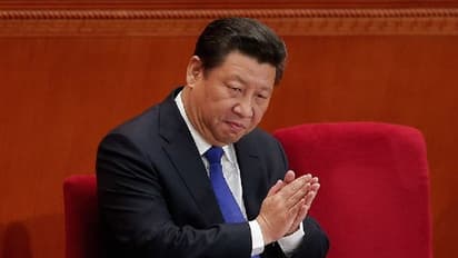 'China will not renounce use of force to unify Taiwan,' says President Xi Jinping; vows to strengthen military