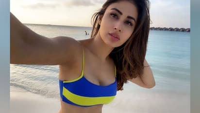 கல்யாணத்துக்கு பின்னும் கவர்ச்சியை கைவிடல... மாலத்தீவில் டாப்லெஸ் போஸ் கொடுத்த KGF நடிகை - வைரலாகும் போட்டோஸ்