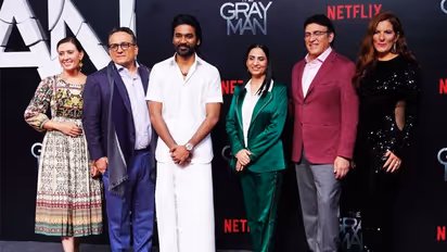 The Gray Man Premiere: Dhanush dons mundu, represents Indian culture as he poses with Russo Brothers