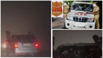 ചുരത്തിൽ ഓടുന്ന കാറിൽ ഡോറിൽ തൂങ്ങി യുവാക്കളുടെ അഭ്യാസം, വീഡിയോ പുറത്ത്; കേസെടുത്ത് എംവിഡി 