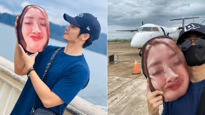 ഭാര്യയുടെ മുഖമുള്ള തലയിണയുമായി 'ടൂര്‍'; യുവാവിന്‍റെ ഫോട്ടോകള്‍ വൈറൽ