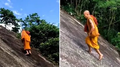 Watch: Monk climbs steep mountain effortlessly; netizens left impressed
