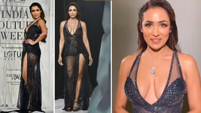 थाई-हाई स्लिट गाउन में रैम्प पर उतरीं मलाइका अरोड़ा, लोगों ने किए 'बुढ़िया पागल हो गई' जैसे कमेंट