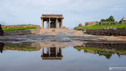 ಮಳೆಯಲ್ಲಿ ಕಣ್ಮನ ಸೆಳೆಯುತ್ತಿದೆ ಹಂಪಿಯ ಸ್ಮಾರಕಗಳ ಸೊಬಗು 