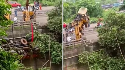 Watch: Crane falls off bridge while lifting truck in Odisha