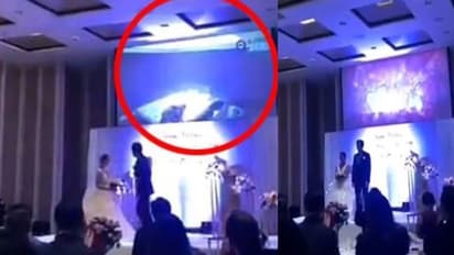 स्टेज पर थे दूल्हा-दुल्हन तभी चलने लगा एडल्ट वीडियो, क्लिप में बिना कपड़ों की वो लड़की कौन थी पता है...