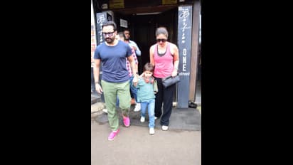 கணவன் மற்றும் மகனுடன் பிங்க் நிற பனியனில் தென்பட்ட கரீனா கபூர் 