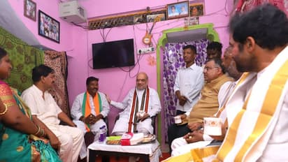 బీజేపీ ద‌ళిత కార్య‌క‌ర్త ఇంటికి వెళ్లిన కేంద్ర మంత్రి అమిత్ షా.. షాక్ అయిన కుటుంబం