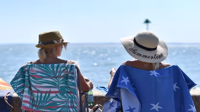 UK breaks another record as heat temperature fails to drop below 26 degrees for entire day in July