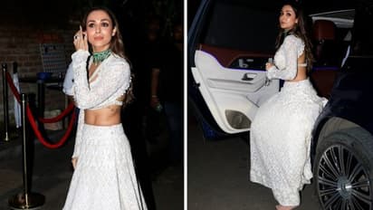 Malaika Arora’s sets cocktail inspiration in gorgeous ivory lehenga with backless bralette