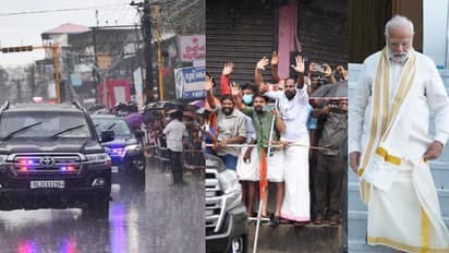 പെരുമഴയത്തും പ്രധാനമന്ത്രിയെ കാത്ത് നൂറുകണക്കിന് ജനം; വഴിയോരങ്ങളില് കാത്ത് നിന്ന് അഭിവാദ്യം