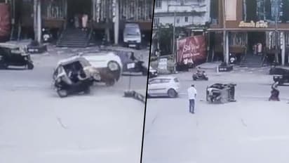 Viral video: Woman narrowly escapes as car rams over an autorickshaw