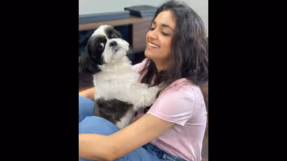 Pictures and Video: Keerthy Suresh bought BMW X7 and took her dog for a drive-WATCH