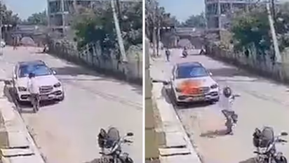 Watch: Man sets fire on Mercedes after car owner fails to pay his dues in Noida; netizens react