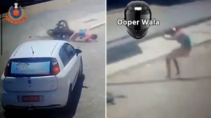 Watch: Man, wearing helmet, dodges death twice; video leaves netizens stunned