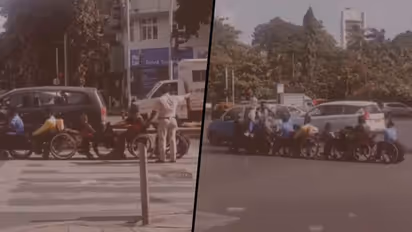 Mumbai traffic cop helps specially-abled people cross busy road; netizens lauds his gesture