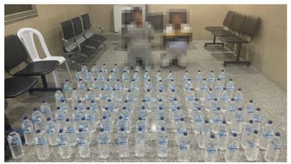 98 കുപ്പി വാറ്റുമായി രണ്ട് പ്രവാസികള് പിടിയില്