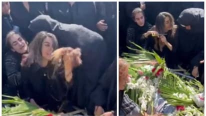 ഹിജാബ് പ്രക്ഷോഭം: കൊല്ലപ്പെട്ട സഹോദരന്റെ ശവസംസ്കാരച്ചടങ്ങിൽ അലറിക്കരഞ്ഞ് മുടി മുറിക്കുന്ന യുവതി