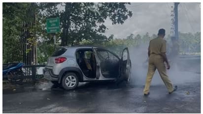 തൃപ്രയാറിൽ  ഓടിക്കൊണ്ടിരുന്ന കാറിന് തീപിടിച്ചു, കുടുംബം അത്ഭുതകരമായി രക്ഷപ്പെട്ടു